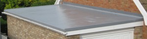 project for flat roofing in nantwich - image is a completed flat roof on shed adjacent to house